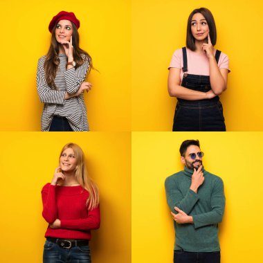 Bir grup insan yukarı bakarken bir fikir üretiyor.