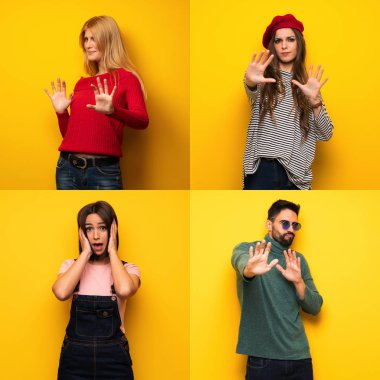 Gergin ve korkmuş bir şekilde elleri öne doğru geren insanlar seti