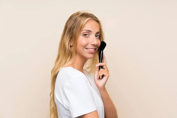 Feliz joven rubia con maquillaje brus — Foto de Stock