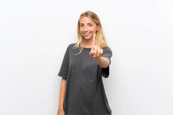 Mujer Joven Rubia Sobre Fondo Blanco Aislado Mostrando Levantando Dedo —  Fotos de Stock