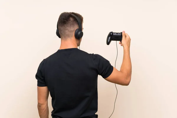 Jonge Knappe Man Spelen Met Een Video Game Controller Geïsoleerde — Stockfoto