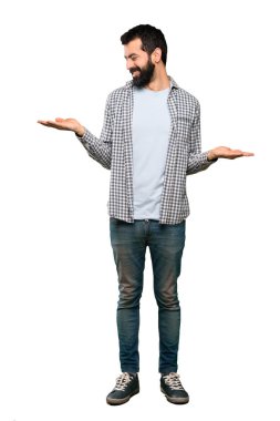 Boşaltmak iki ile tutarak sakallı yakışıklı adam izole beyaz arka plan üzerinde eller