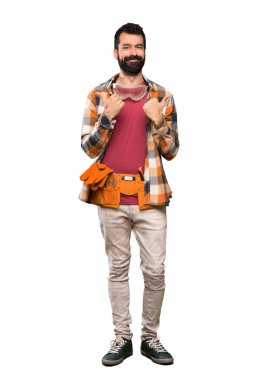 Jest kadar başparmak ve izole beyaz arka plan üzerinde gülümseyen usta adam