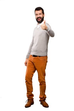 Izole beyaz arka plan üzerinde iyi bir şey oldu çünkü başparmak ile Yakışıklı adam