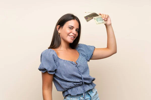 Jovencita Sobre Aislado Fondo Tomando Montón Dinero —  Fotos de Stock