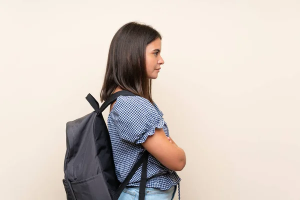 Chica Joven Sobre Fondo Aislado Con Mochila —  Fotos de Stock