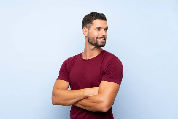 Handsome Man Isolated Blue Background Arms Crossed Happy — Stock Photo, Image