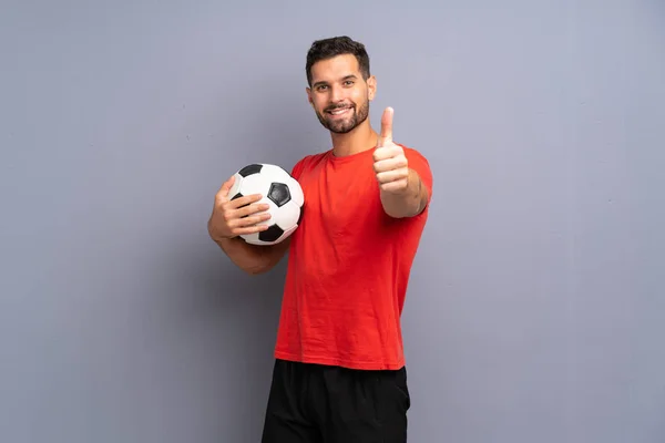 Guapo Joven Jugador Fútbol Hombre Sobre Aislado Pared Blanca Con —  Fotos de Stock