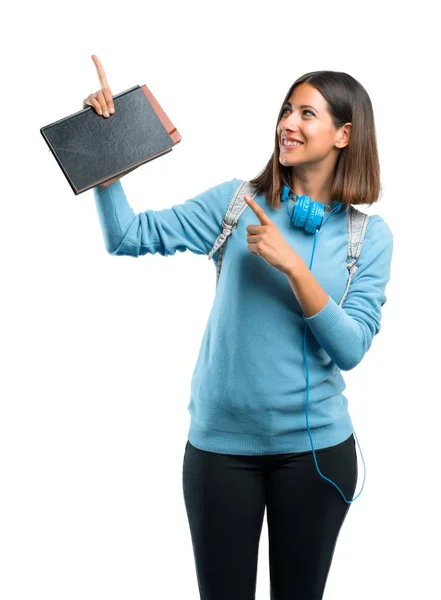 Jonge Student Meisje Met Blauwe Trui Hoofdtelefoon Wijzend Met Wijsvinger — Stockfoto