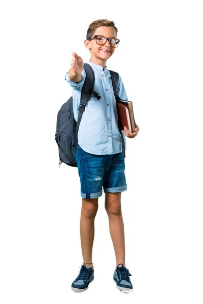 孤立した白い背景に良い取引の後に握手バックパックとメガネを持つ学生の男の子のフルボディ — ストック写真