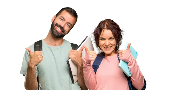 Zwei Studenten Mit Rucksäcken Und Büchern Die Eine Daumen Hoch — Stockfoto