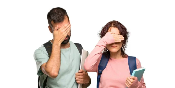 Dos Estudiantes Con Mochilas Libros Cubriendo Los Ojos Con Las —  Fotos de Stock