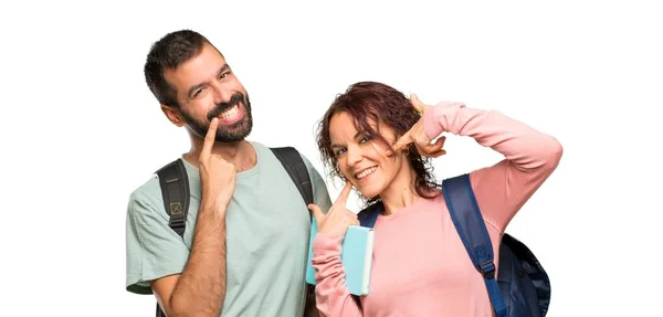 Två Studenter Med Ryggsäckar Och Böcker Leende Med Ett Behagligt — Stockfoto