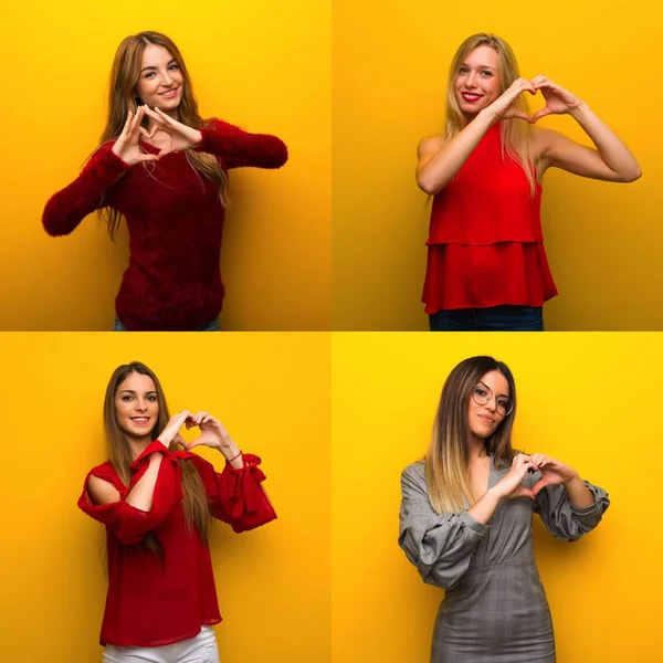 Reihe Junger Frauen Die Mit Den Händen Herzsymbole Herstellen — Stockfoto