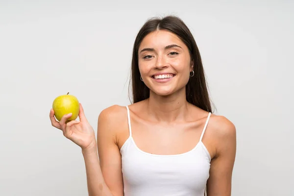 Mujer joven y bonita con una manzana — Foto de Stock