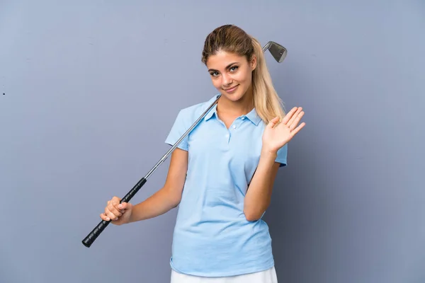 Teenager Golfer Girl Grey Wall Saluting Hand Happy Expression — Stock Photo, Image