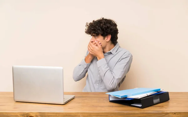 Young Student Man Laptop Covering Mouth Looking Side — Stock Photo, Image