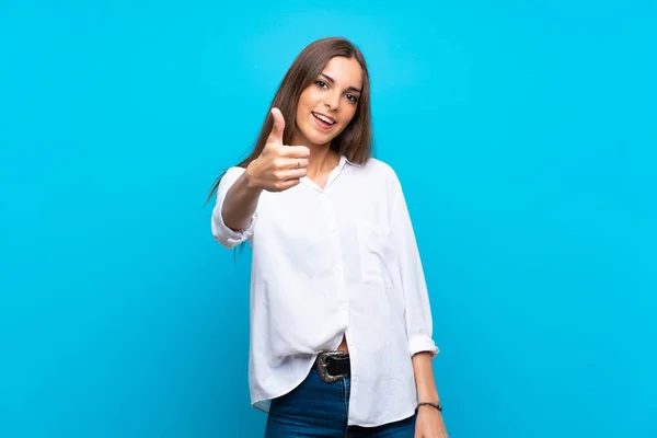 Young Woman Isolated Blue Background Thumbs Because Something Good Has — Stock Photo, Image