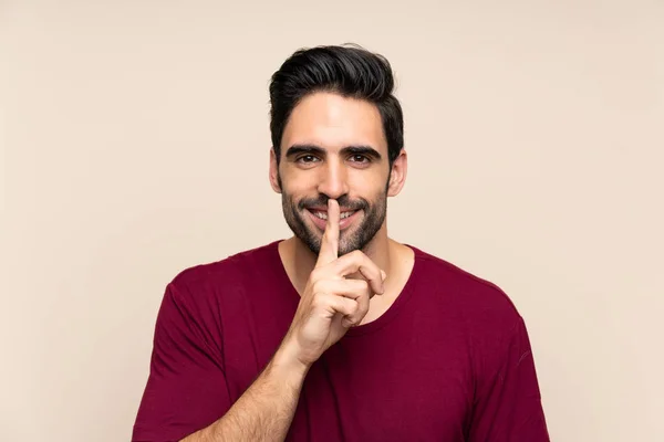 Guapo Joven Sobre Aislado Fondo Haciendo Gesto Silencio — Foto de Stock