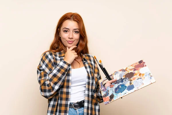 Adolescente Pelirroja Chica Sosteniendo Una Paleta Sobre Aislado Fondo Riendo — Foto de Stock