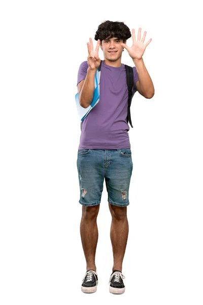 孤立した白い背景の上に指で8を数える若い学生の男のフルレングスショット — ストック写真