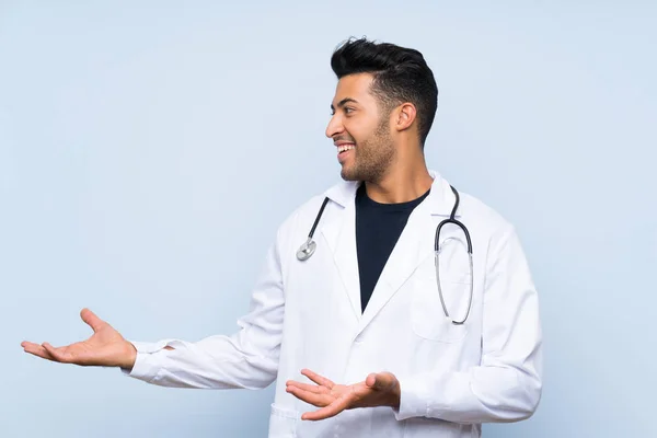 Young Doctor Man Isolated Blue Wall Surprise Facial Expression — Stock Photo, Image