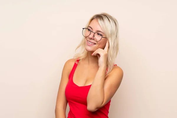 Junge Blonde Frau Über Isoliertem Hintergrund Mit Brille — Stockfoto