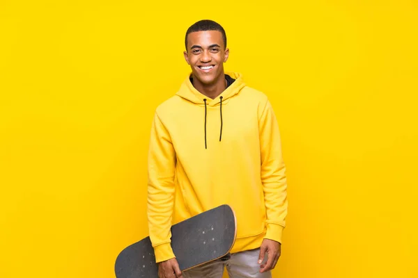 Afro American skater man over isolated white background — Stok Foto