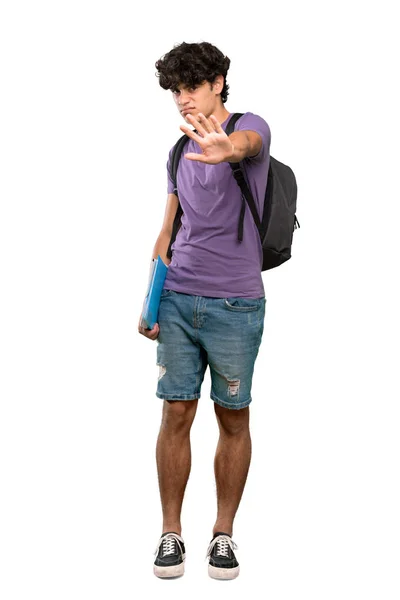 一个年轻学生男子紧张地将手伸向前方 在孤立的白色背景上拍摄的全长照片 — 图库照片