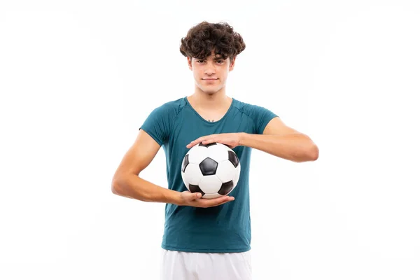 Young Football speler man over geïsoleerde witte muur — Stockfoto