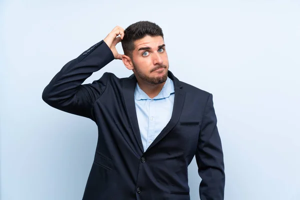 Hombre Guapo Sobre Fondo Azul Aislado Con Una Expresión Frustración —  Fotos de Stock