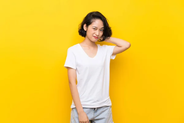 Asiática Joven Mujer Sobre Aislado Amarillo Pared Tener Dudas — Foto de Stock