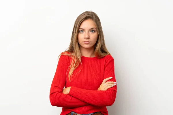 Mujer Rubia Joven Con Suéter Rojo Sobre Fondo Blanco Aislado —  Fotos de Stock