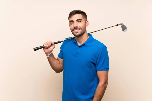 Молодий красивий чоловік-гольф над ізольованим тлом — стокове фото