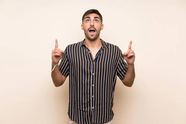 Hombre Guapo Con Barba Sobre Fondo Aislado Señalando Con Dedo — Foto de Stock