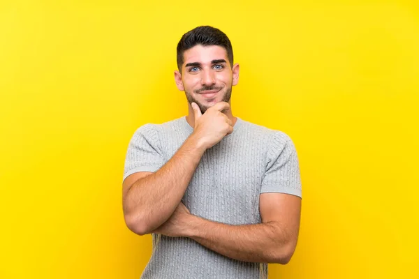 Joven Hombre Guapo Sobre Aislado Amarillo Fondo Riendo —  Fotos de Stock