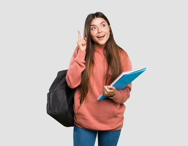 Jovem Estudante Segurando Cadernos Com Intenção Realizar Solução Levantando Dedo — Fotografia de Stock