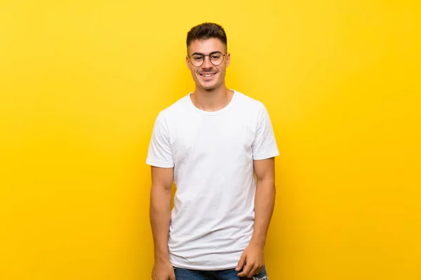 Young Handsome Man Isolated Yellow Background Glasses Happy — ストック写真