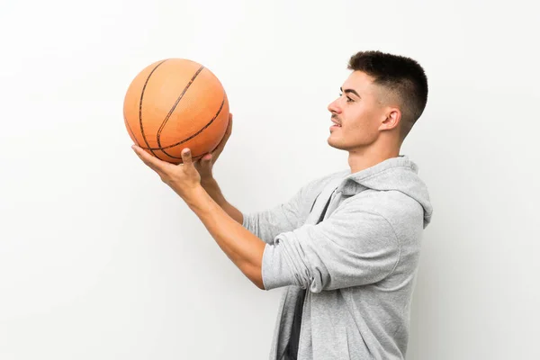 Olahraga manusia atas dinding putih terisolasi dengan bola basket — Stok Foto