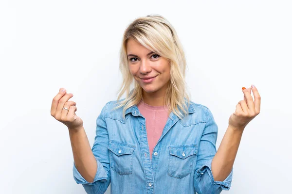 Young Blonde Woman Isolated White Background Making Money Gesture — ストック写真