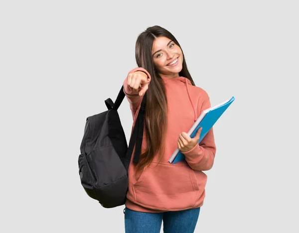 Joven Estudiante Sosteniendo Cuadernos Apuntando Con Dedo Usted Con Una — Foto de Stock