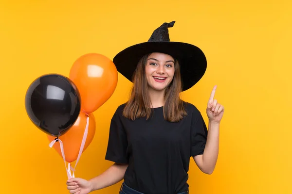 Giovane Strega Che Tiene Palloncini Aria Neri Arancioni Feste Halloween — Foto Stock