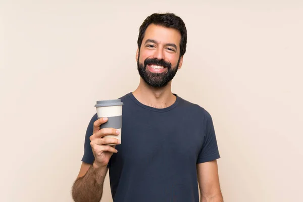 Hombre Con Barba Sosteniendo Café Sonriendo Mucho — Foto de Stock