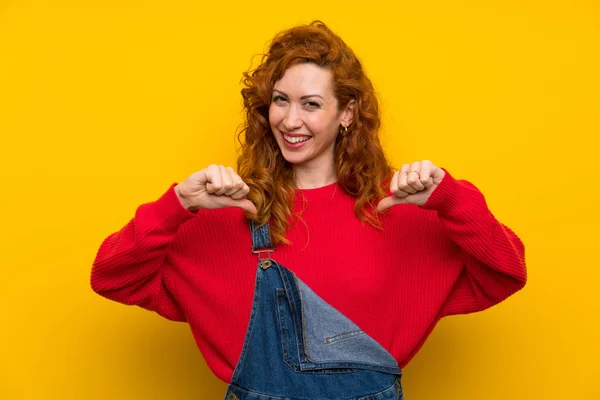 Redhead Woman Overalls Isolated Yellow Wall Proud Self Satisfied — Φωτογραφία Αρχείου