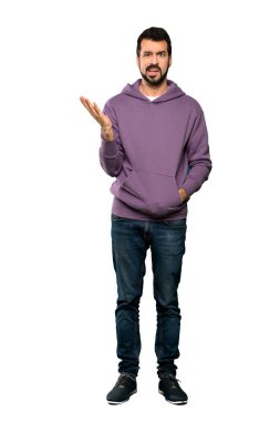 Yakışıklı adam kazak yapımı şüpheler jest izole beyaz arka plan üzerinde tam uzunlukta atış