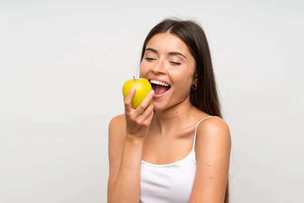 Mujer joven y bonita con una manzana — Foto de Stock