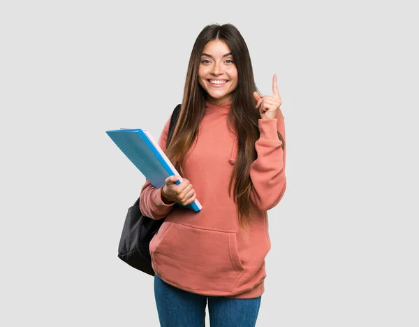 Ung Student Kvinna Med Anteckningsböcker Pekar Upp Bra Idé Över — Stockfoto