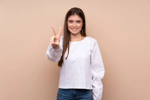 Young Girl Isolated Background Smiling Showing Victory Sign — Stock Photo, Image