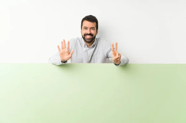 Young Handsome Man Beard Holding Big Green Empty Placard Counting — Stock Photo, Image