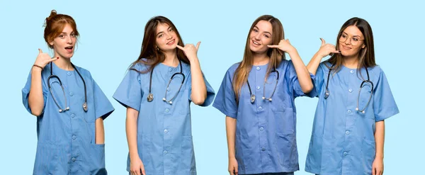 Group Nurses Making Phone Gesture Call Back Sign — Stock Photo, Image